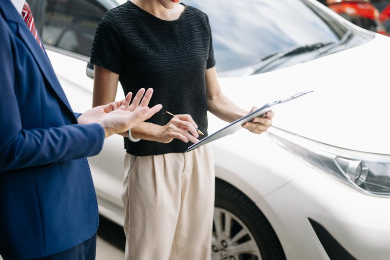 Customers and car insurance agent